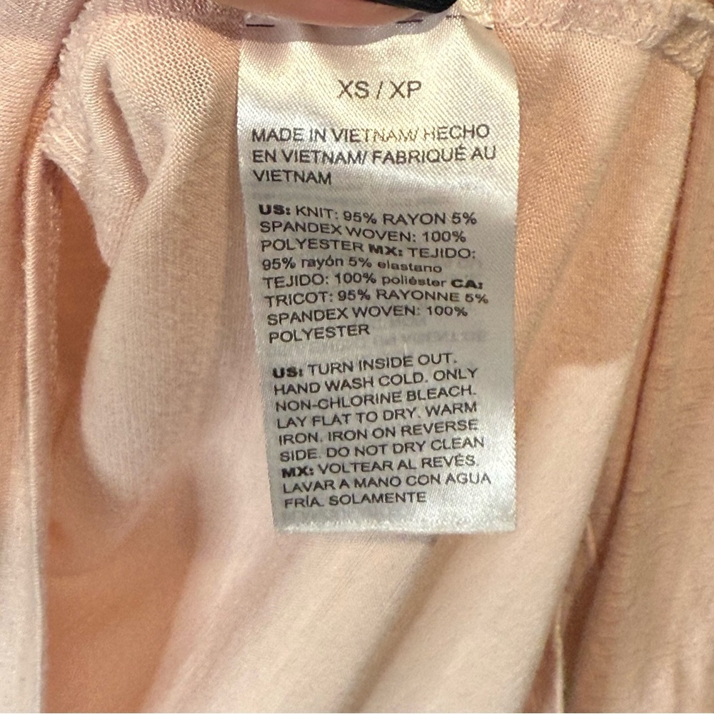White House Black Market Soft Pink Long Sleeve Top with subtle shimmery lines - Picture 9 of 14